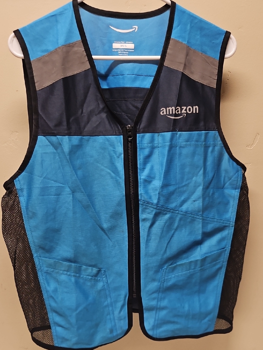 Amazon Bright Blue Delivery Vest with Black Trim and Gray Accents